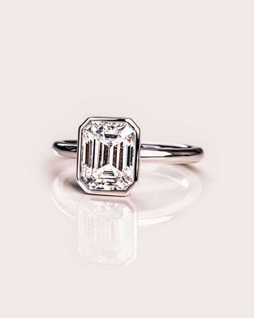 Lumea Aube™ Ring • Emerald Cut · Full Bezel Setting